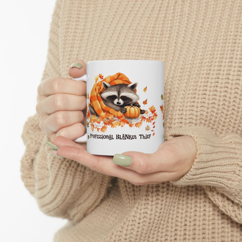 Professional Blanket Thief Raccoon Mug | Funny Fall Coffee Mug | Cozy Autumn Raccoon Mug | Pumpkin Coffee Cup | Cute Woodland Gift