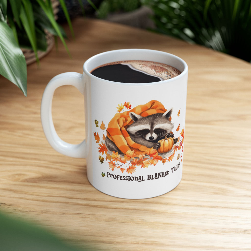 Professional Blanket Thief Raccoon Mug | Funny Fall Coffee Mug | Cozy Autumn Raccoon Mug | Pumpkin Coffee Cup | Cute Woodland Gift