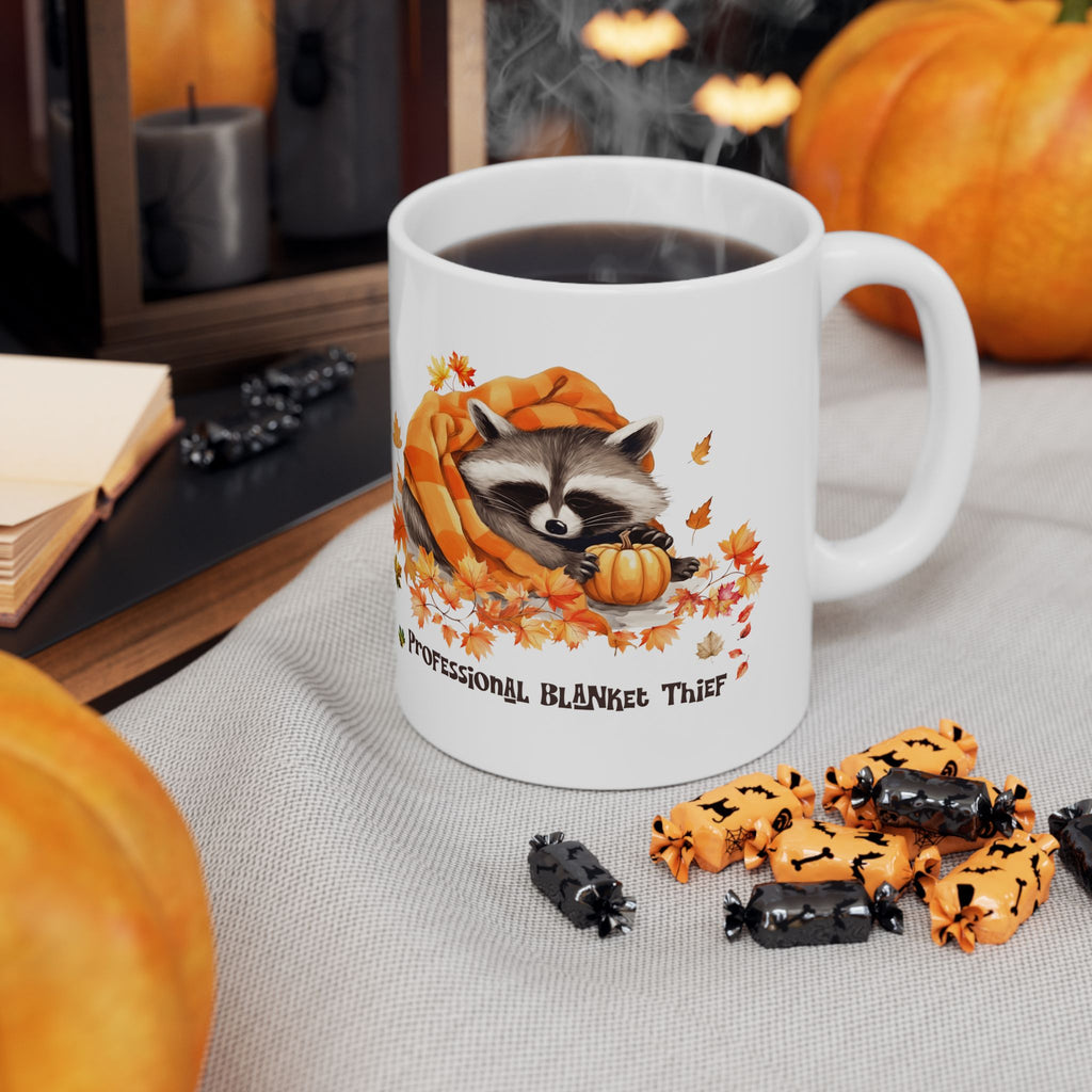Professional Blanket Thief Raccoon Mug | Funny Fall Coffee Mug | Cozy Autumn Raccoon Mug | Pumpkin Coffee Cup | Cute Woodland Gift