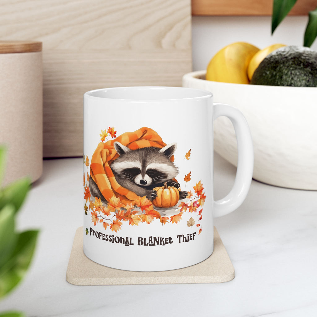 Professional Blanket Thief Raccoon Mug | Funny Fall Coffee Mug | Cozy Autumn Raccoon Mug | Pumpkin Coffee Cup | Cute Woodland Gift