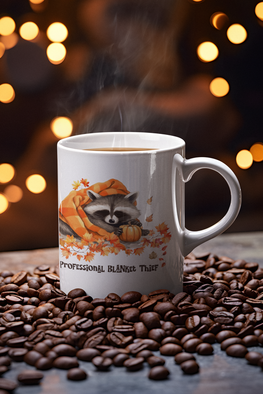 Professional Blanket Thief Raccoon Mug | Funny Fall Coffee Mug | Cozy Autumn Raccoon Mug | Pumpkin Coffee Cup | Cute Woodland Gift